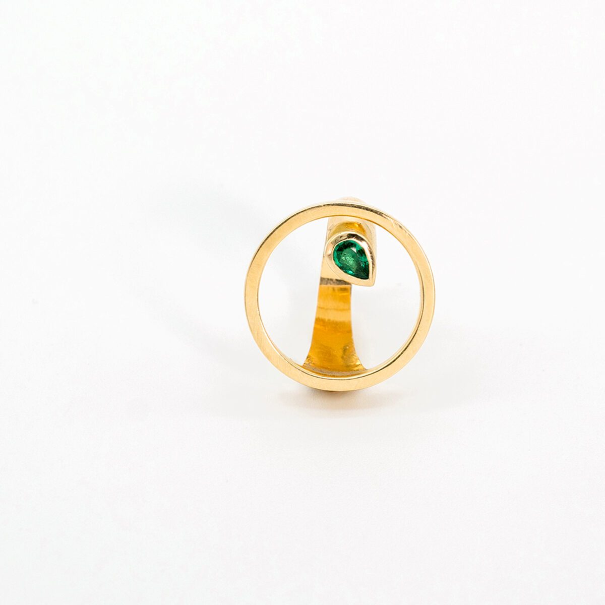 anillo único oro con esmeralda